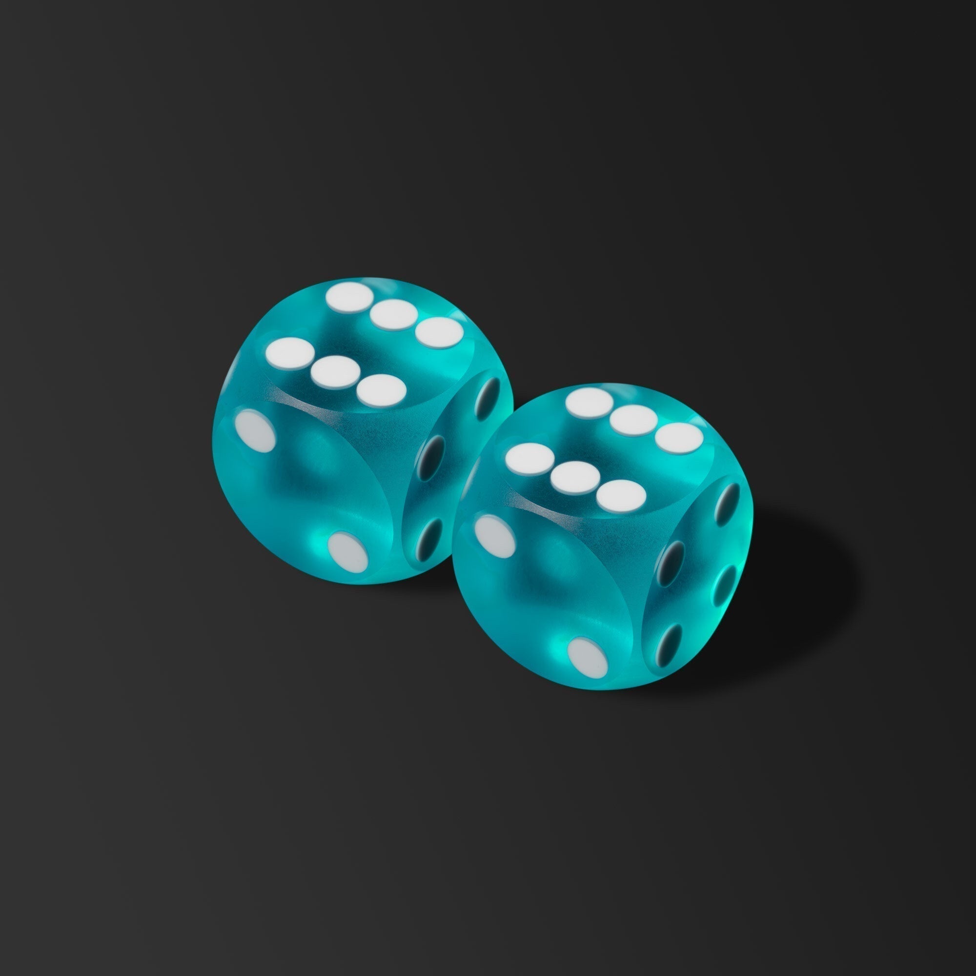 pair of azur colored backgammon precision dice laying on black background