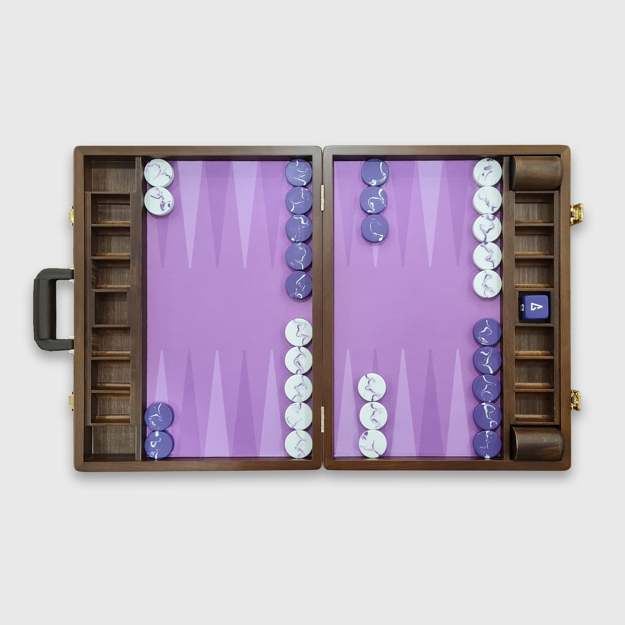 A tournament-sized Backgammon board with purple playing surfaces, checkers, a doubling cube, and dice cups, housed in a wooden case with a handle.