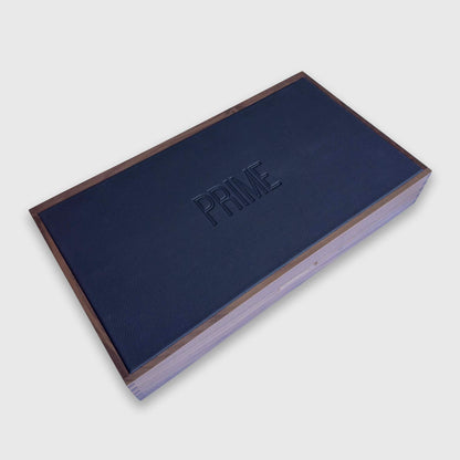 Closed "PRIME" backgammon board with the Prime logo showing on the case