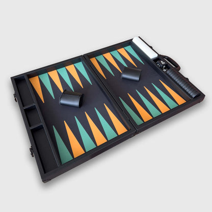 A black "Nova" backgammon board set with teal and orange triangle points, shown open on a light gray background. The set includes a black carrying case, dice cup, and game pieces.