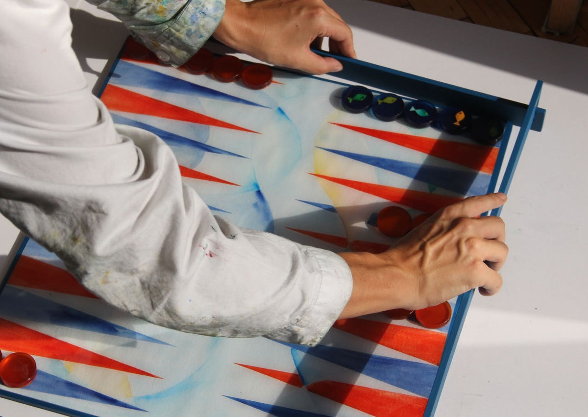 Playing on the hand-painted Water board