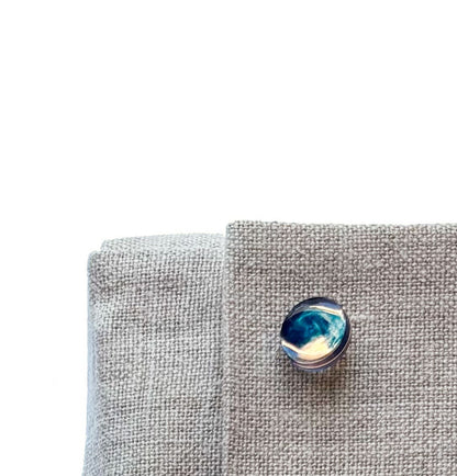 Checker used as a button on the linen case