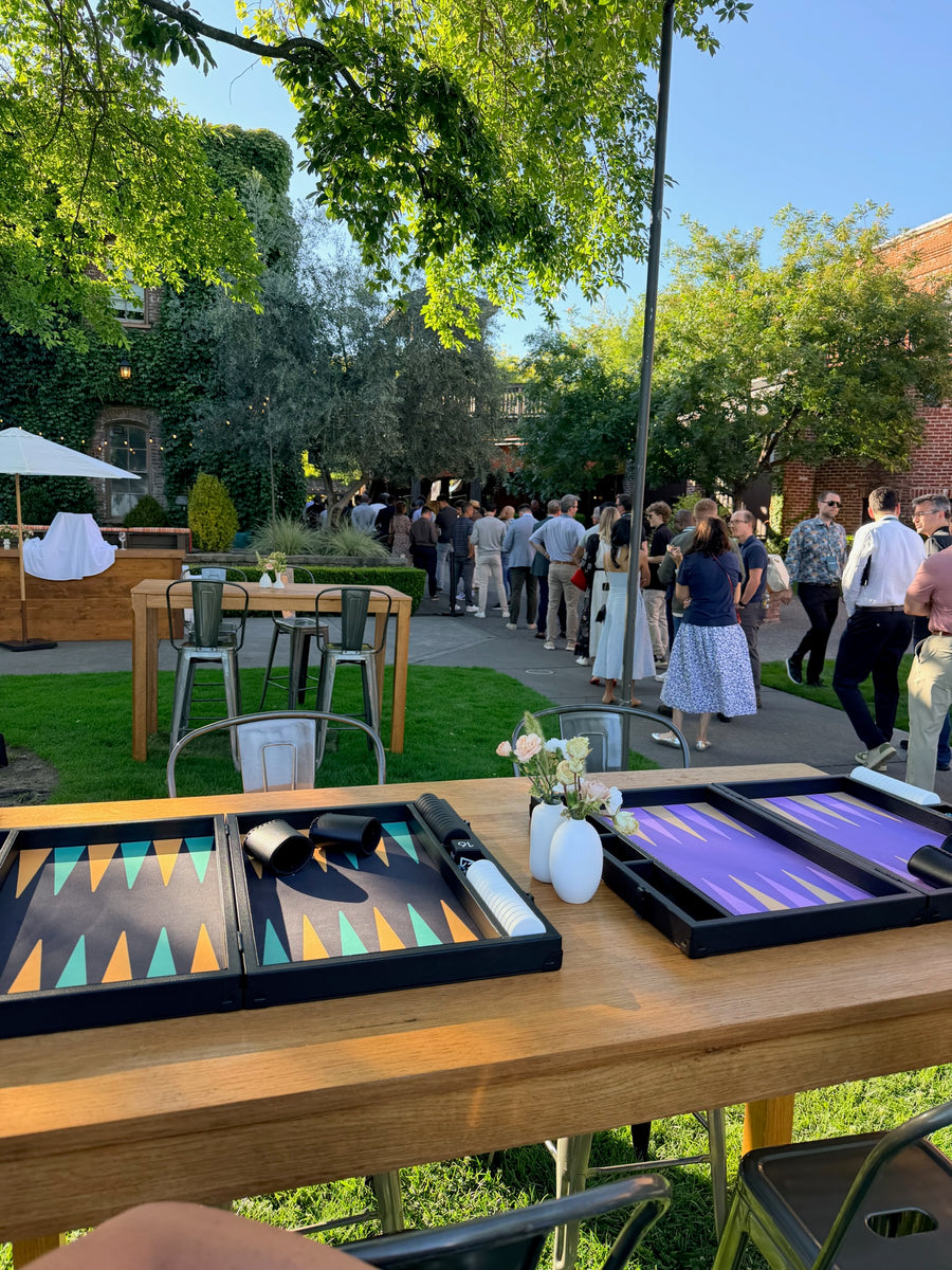Nova boards set up on garden tables at an outdoor event